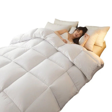 Couette avec deux oreillers déjà remplis